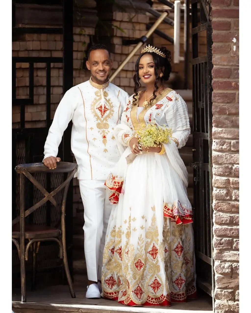 A Perfect Pair in Red Habesha Couples Outfit: Meticulously Designed Ethiopian Couples Attire